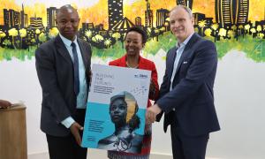 From left to right: Kennedy Matheka, State Department for Public Works Eva Murray, CEO BSD Group Dr. Peter Graham, CEO Global Buildings Performance Network(GBPN)  Holding up the physical version of the Toolkit