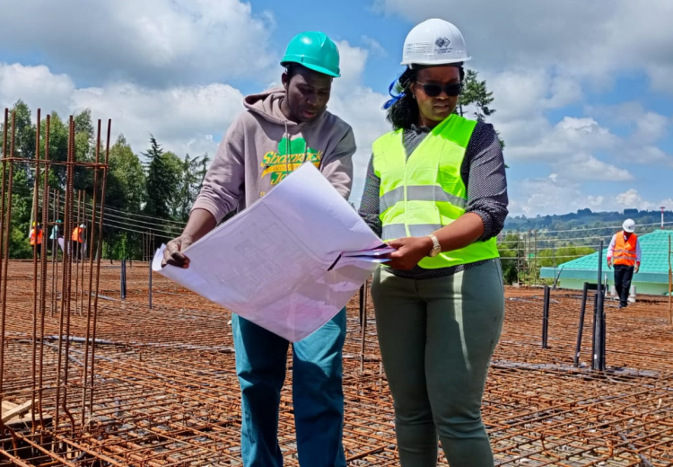 Electrical Engineer  Victoria Mutunga giving instructions on site